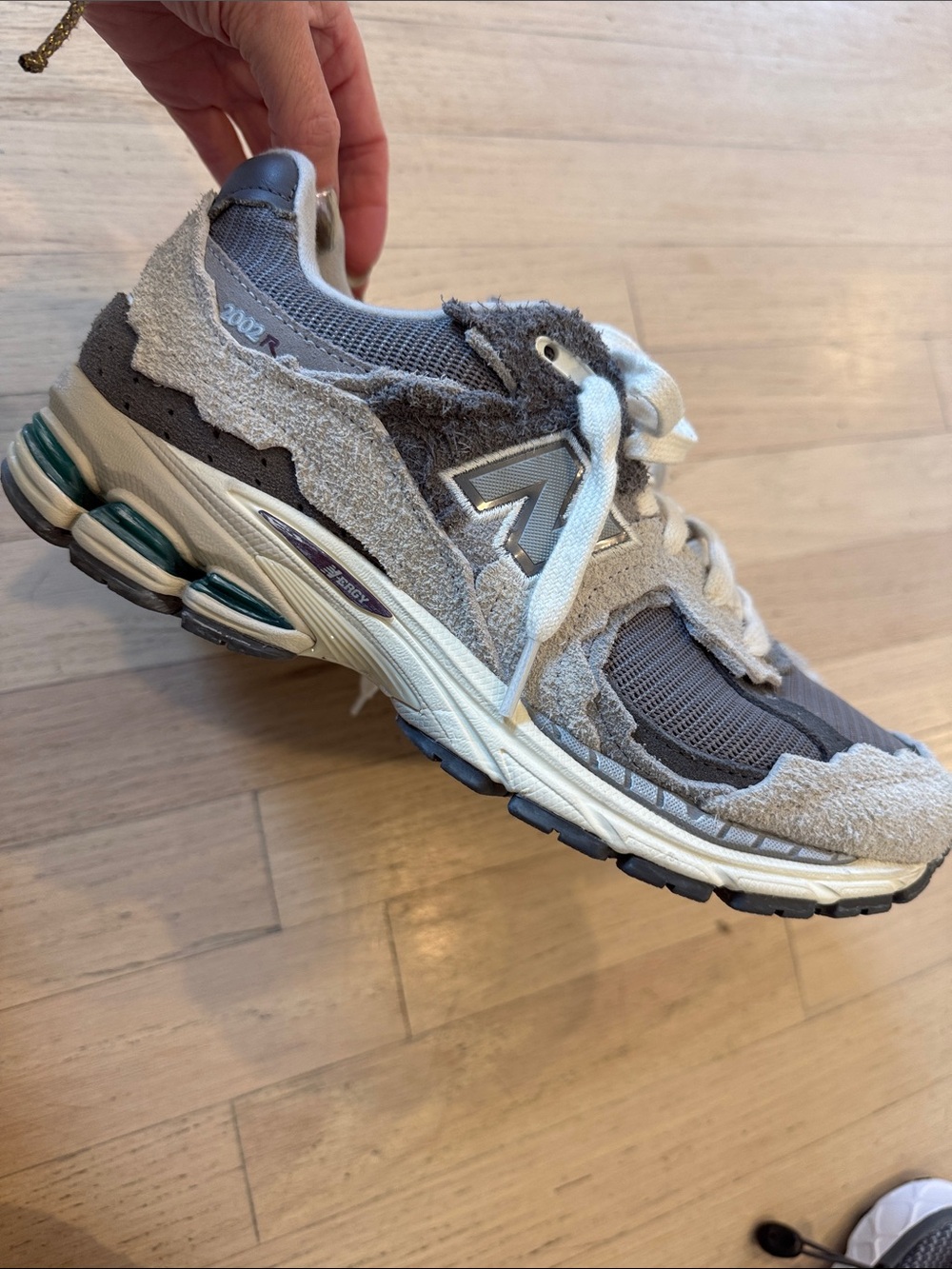 New Balance gray and cream 2002R suede mesh sneaker